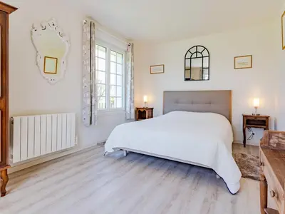 Un ou plusieurs lits dans un hébergement de l'établissement Holiday Home Les Moutons by Interhome