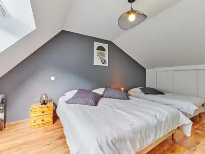 Un ou plusieurs lits dans un hébergement de l'établissement Holiday Home Le Lanchon by Interhome