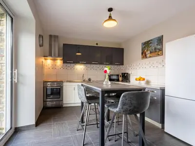 Cuisine ou kitchenette dans l'établissement Holiday Home La Lucerie by Interhome
