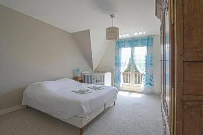 Un ou plusieurs lits dans un hébergement de l'établissement La Villa Boutrois