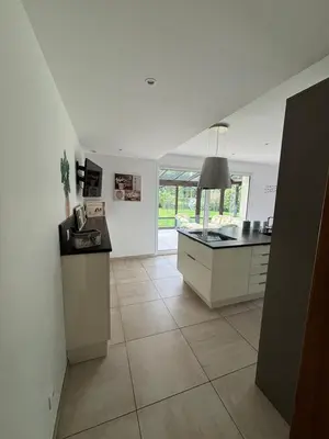 Cuisine ou kitchenette dans l'établissement La Villa Boutrois