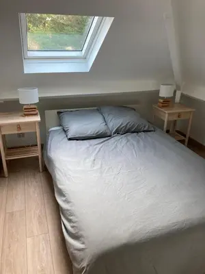 Un ou plusieurs lits dans un hébergement de l'établissement Villa très proche de la plage