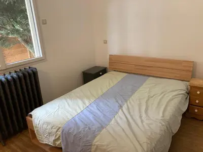 Un ou plusieurs lits dans un hébergement de l'établissement Villa très proche de la plage