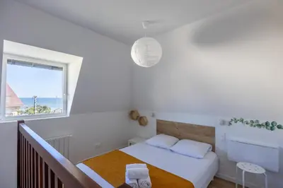 Un ou plusieurs lits dans un hébergement de l'établissement Duplex Les Mouettes - Welkeys