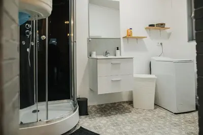 Salle de bains dans l'établissement Les Malakoff