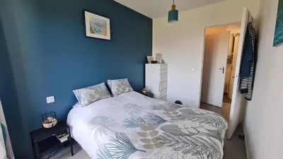 Un ou plusieurs lits dans un hébergement de l'établissement Appartement lumineux dans résidence calme et arborée
