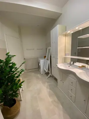 Salle de bains dans l'établissement Appartement duplex Luc sur Mer, en face de la plage