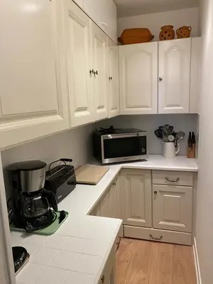 Cuisine ou kitchenette dans l'établissement Appartement duplex Luc sur Mer, en face de la plage