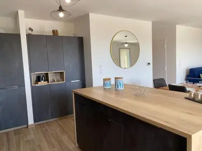 Cuisine ou kitchenette dans l'établissement L'Abri Côtier