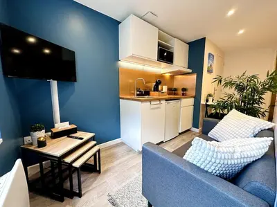 Cuisine ou kitchenette dans l'établissement Le Bleu du Mont