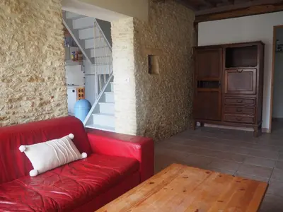 Coin salon dans l'établissement Gite de la petite maison