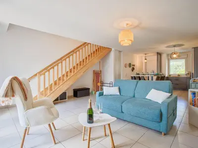 Coin salon dans l'établissement Appartement familial à 250m du golf et de la plage, parking inclus - Varaville - FR-1-788-16