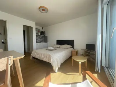 Un ou plusieurs lits dans un hébergement de l'établissement Studio - balcon - bord de mer