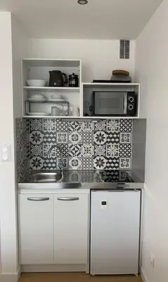 Cuisine ou kitchenette dans l'établissement Studio - balcon - bord de mer