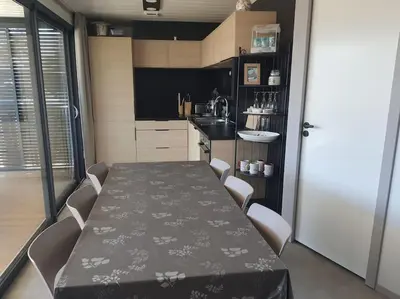 Cuisine ou kitchenette dans l'établissement Cottage 4-6 pers-piscine chauffée-150m plage