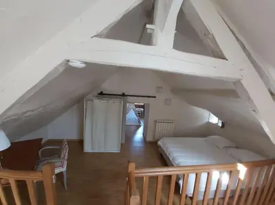 Un ou plusieurs lits dans un hébergement de l'établissement Gîte en pleine nature