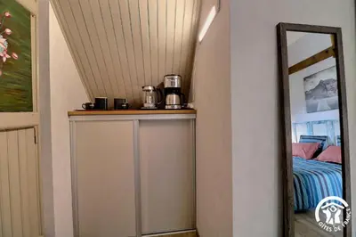 Cuisine ou kitchenette dans l'établissement Le trotteur
