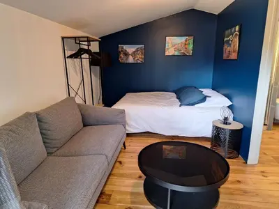 Un ou plusieurs lits dans un hébergement de l'établissement Chalet dans jardin privatif
