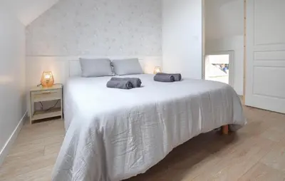 Un ou plusieurs lits dans un hébergement de l'établissement Cozy Home In La Pernelle With Wifi