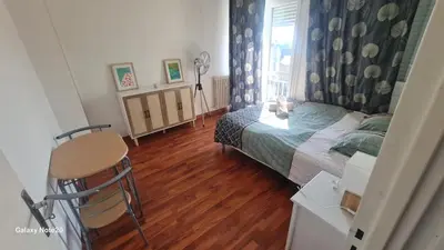 Un ou plusieurs lits dans un hébergement de l'établissement Appartement à 1km de la gare de Caen et 9 Kms de la plage