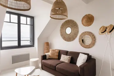 Coin salon dans l'établissement Ty Peskaiden 2 - Appt vue mer à Cancale