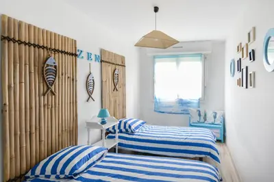 Un ou plusieurs lits dans un hébergement de l'établissement Pégase Bleu - A 500m de la plage