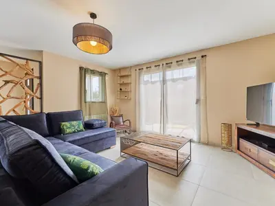 Télévision ou salle de divertissement dans l'établissement Holiday Home Les sablons by Interhome