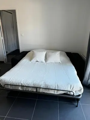 Un ou plusieurs lits dans un hébergement de l'établissement Au cœur de Port