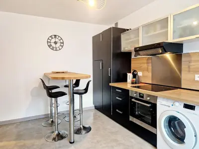 Cuisine ou kitchenette dans l'établissement La Porte Du Midi