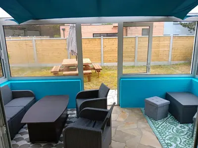 Coin salon dans l'établissement Maison charmante à Port-Bail-sur-Mer, grand jardin clos
