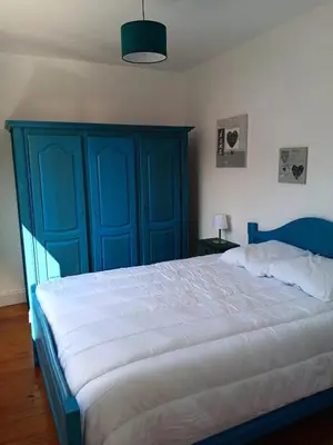 Un ou plusieurs lits dans un hébergement de l'établissement Maison charmante à Port-Bail-sur-Mer, grand jardin clos