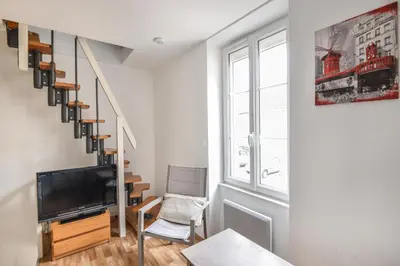 Télévision ou salle de divertissement dans l'établissement L'Écrin de Douvres - Charmante maison pour 2p