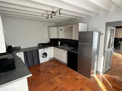 Cuisine ou kitchenette dans l'établissement Entre pierres & mer
