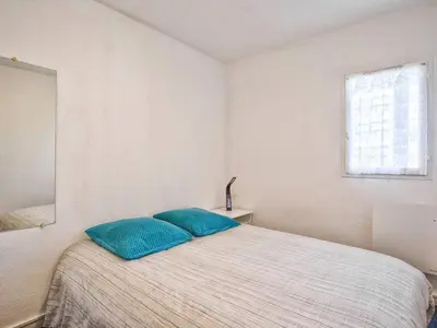 Un ou plusieurs lits dans un hébergement de l'établissement Appartement lumineux avec balcons et stationnement privatif - FR-1-788-22