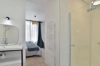 Un ou plusieurs lits dans un hébergement de l'établissement La Villa des Fontenelles - Proche de la mer