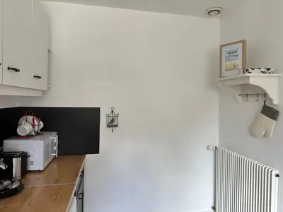 Cuisine ou kitchenette dans l'établissement Loc MI