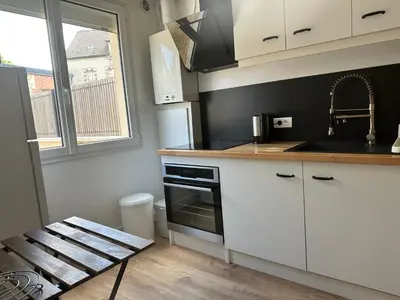 Cuisine ou kitchenette dans l'établissement Loc MI