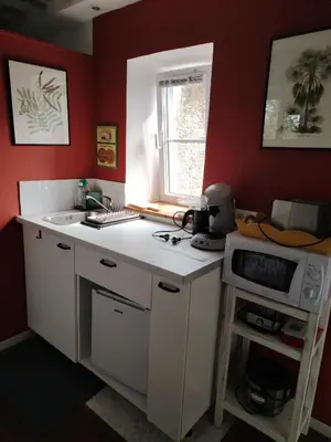 Cuisine ou kitchenette dans l'établissement Chambre chez Didier et Corinne