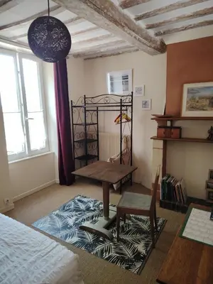 Un ou plusieurs lits dans un hébergement de l'établissement Chambre chez Didier et Corinne