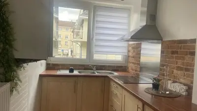 Cuisine ou kitchenette dans l'établissement Appartement spacieux à Caen 65 m² avec balcon vue sur la ville