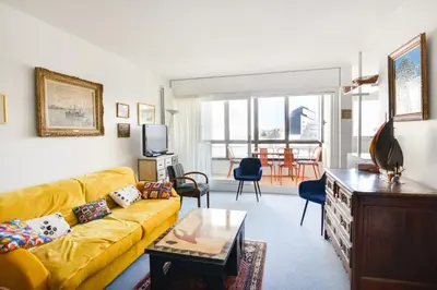 Coin salon dans l'établissement Le Balcon sur Juno - A 10min à pied de la plage