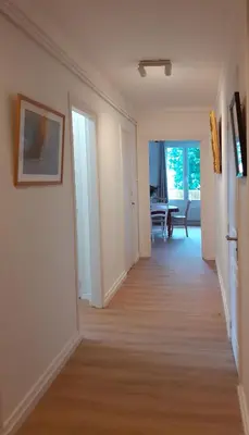 Télévision ou salle de divertissement dans l'établissement Le Quai de Juillet
