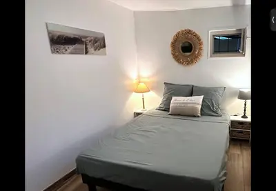 Un ou plusieurs lits dans un hébergement de l'établissement Cottage, L étrille, WIFI gratuit, proche de la mer, jardin, terrasse