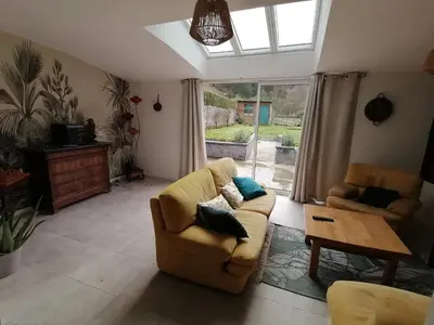 Coin salon dans l'établissement Maison champêtre à Gavray-sur-Sienne avec jardin clôturé