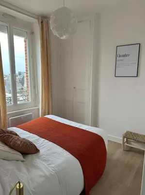Un ou plusieurs lits dans un hébergement de l'établissement La Belle brise