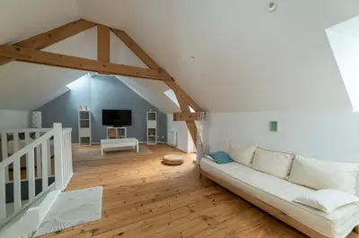 Télévision ou salle de divertissement dans l'établissement Suisse Normande Refuge - Maison à la campagne 6p