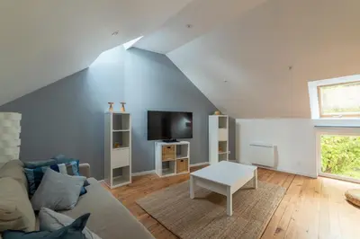 Télévision ou salle de divertissement dans l'établissement Suisse Normande Refuge - Maison à la campagne 6p