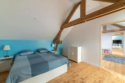 Un ou plusieurs lits dans un hébergement de l'établissement Suisse Normande Refuge - Maison à la campagne 6p