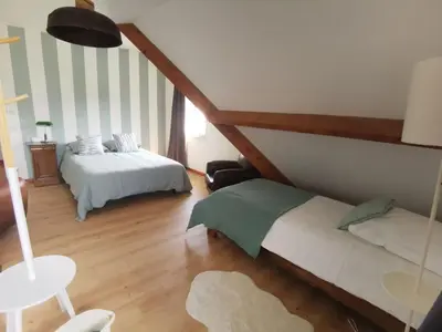 Un ou plusieurs lits dans un hébergement de l'établissement Maison familiale - Plage 300m
