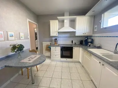 Cuisine ou kitchenette dans l'établissement Maison familiale - Plage 300m